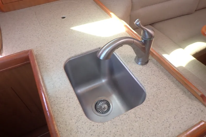 Slide: The Image of Stainless steel sink in 2008 Hunter 33 yacht kitchen area. - 29