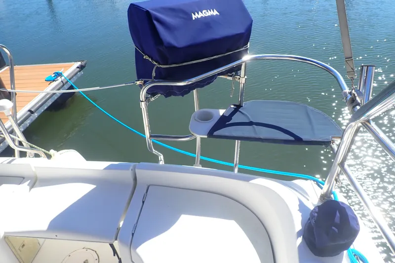 Slide: The Image of Hunter 33 sailboat deck with Magma grill, docked, 2008 model. - 11