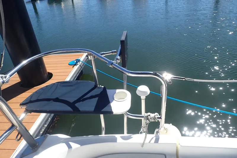 Slide: The Image of Sailboat deck view, Hunter 33 model, 2008, docked by sparkling water. - 12