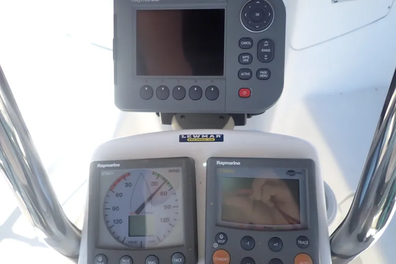 Slide: The Image of Control panel of a 2008 Hunter 33 sailboat with Raymarine instruments. - 6