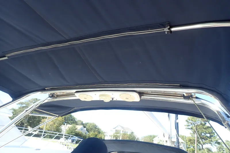 Slide: The Image of Bimini top of a 2008 Hunter 33 sailboat with stainless steel frame. - 37
