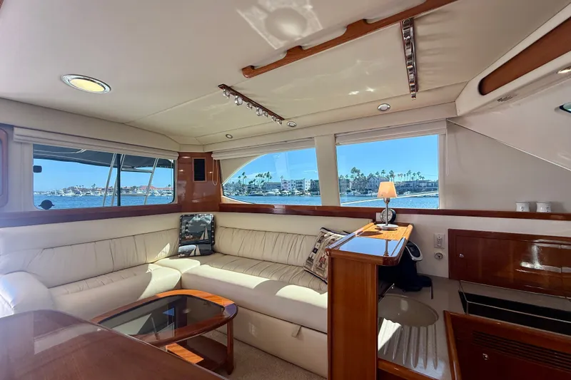 Slide: The Image of Luxurious interior of 2006 Riviera 40 Flybridge yacht with scenic ocean view. - 19