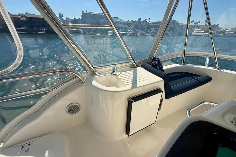 Slide: The Image of Interior view of 2006 Riviera 40 Flybridge yacht with seating and sink. - 88