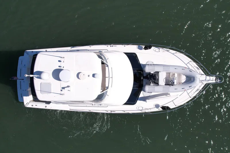 Slide: The Image of Aerial view of 2006 Riviera 40 Flybridge yacht on water. - 11