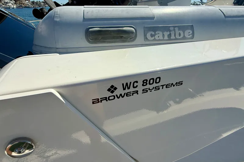 Slide: The Image of 2006 Riviera 40 Flybridge with Caribe inflatable boat and Brower Systems WC 800. - 72