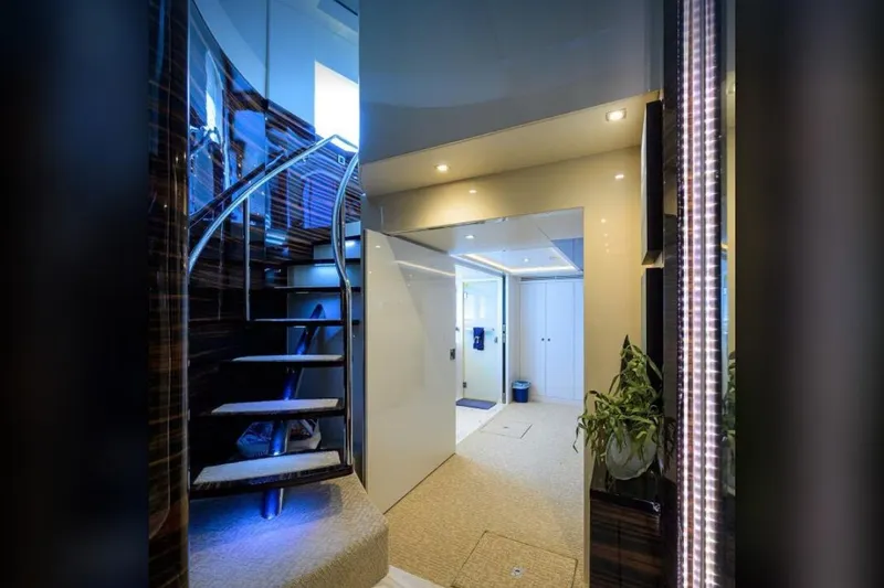 Slide: The Image of Luxurious interior of 2014 Hampton Fly yacht with modern staircase and elegant lighting. - 15