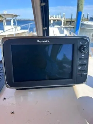Slide: The Image of Raymarine navigation system on 1999 Atlas Boat Works Acadia 25, docked at marina. - 21