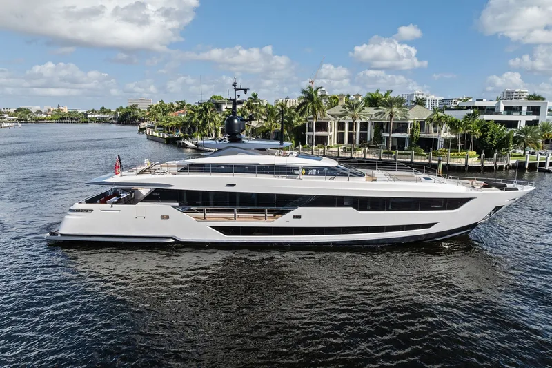 The Image of Luxurious 2024 Custom Line 120' yacht cruising on a scenic waterway. - 0