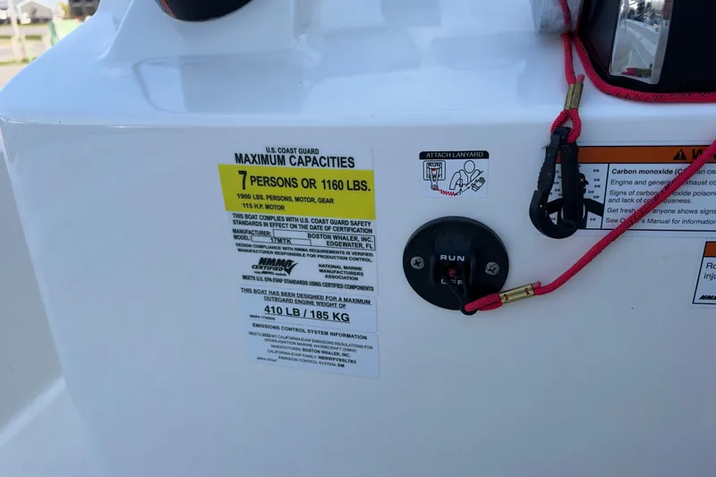 Slide: The Image of 2022 Boston Whaler 170 Montauk capacity label, showing limits and safety instructions. - 17
