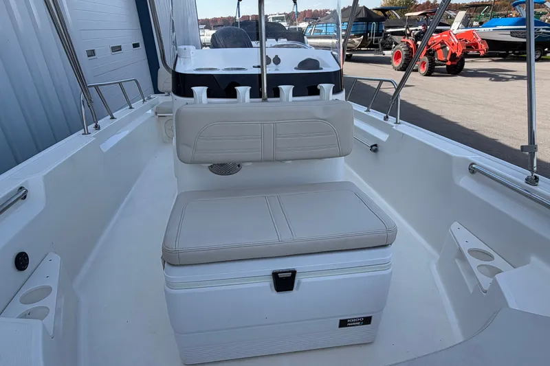 Slide: The Image of 2022 Boston Whaler 170 Montauk boat interior with seating and storage. - 10