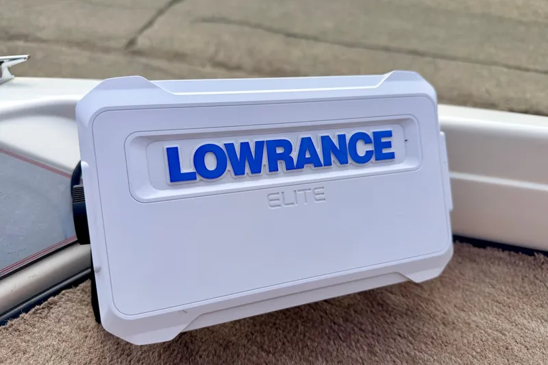 Slide: The Image of Lowrance Elite fish finder on 1994 Skeeter SS140 boat dashboard. - 63