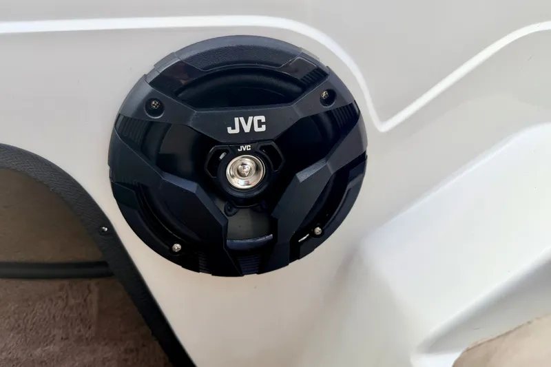 Slide: The Image of JVC speaker installed on a 1994 Skeeter SS140 boat, showcasing modern audio equipment. - 69