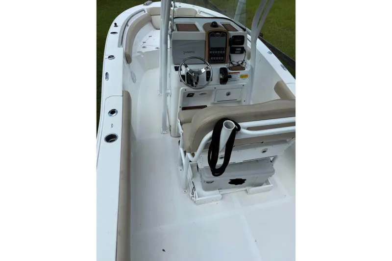 Slide: The Image of 2016 Sea Fox 246 Commander boat interior with steering console and seating. - 4