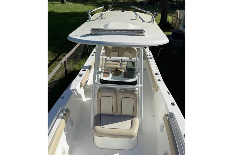 Slide: The Image of 2016 Sea Fox 246 Commander boat interior with seating and console. - 5