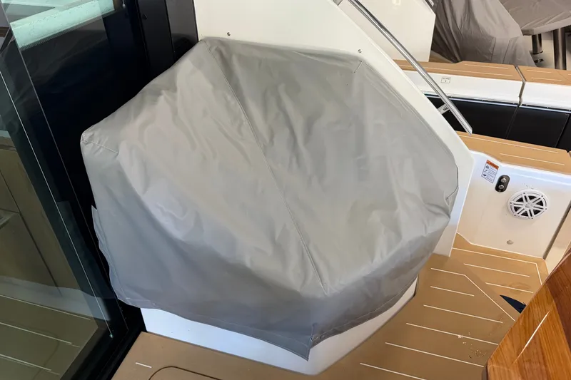 Slide: The Image of Covered seating area on 2026 Tiara Yachts EX 54, featuring sleek design and modern amenities. - 42
