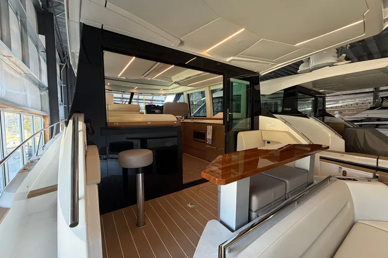 Slide: The Image of Luxurious interior of 2026 Tiara Yachts EX 54, featuring sleek design and modern amenities. - 40