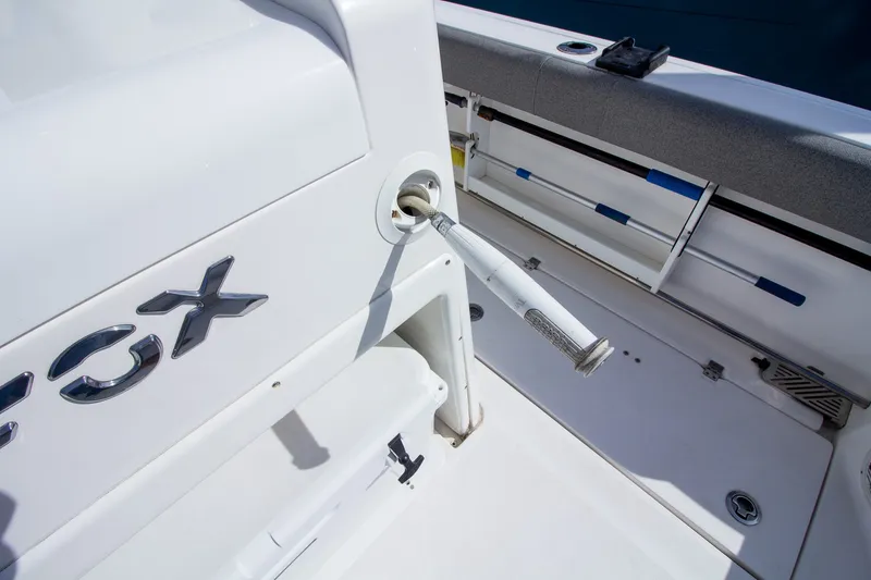 Slide: The Image of Close-up of a 2019 Sea Fox 328 Commander deck with a fishing rod holder. - 40