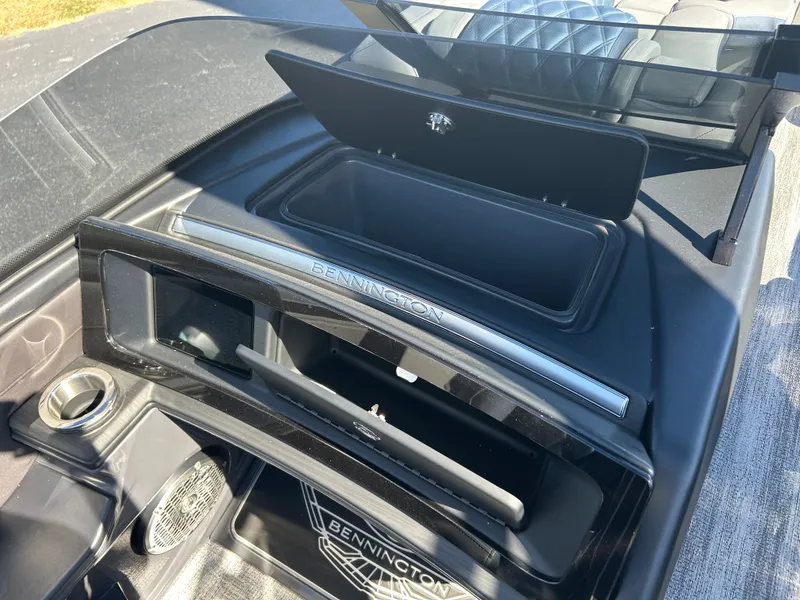 Slide: The Image of The image shows the dashboard of a 2027 Bennington 27QXSB with modern controls. - 23