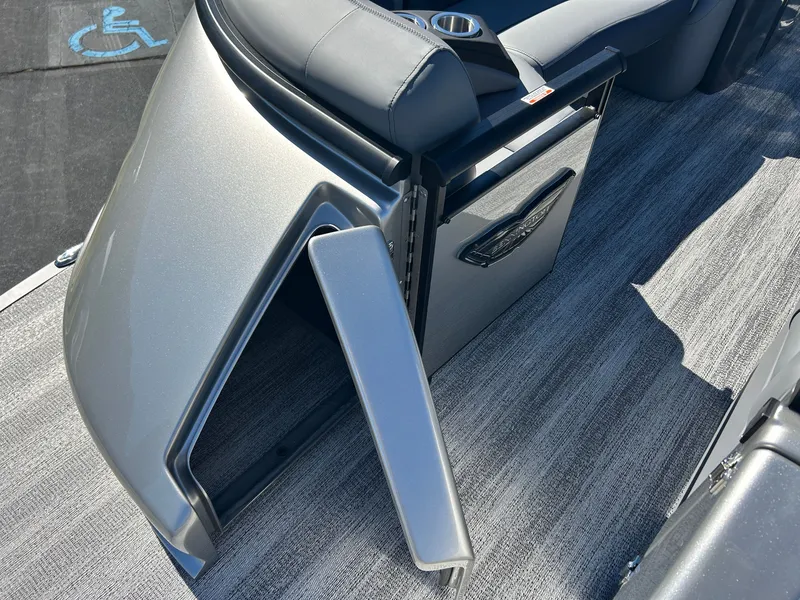 Slide: The Image of Close-up of a modern boat seat with gray upholstery and cup holders. - 37