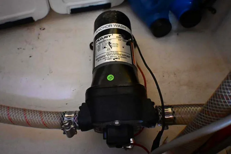 Slide: The Image of Anchor wash pump in a 2002 Island Packet 350 sailboat, featuring Flojet model 4325. - 67