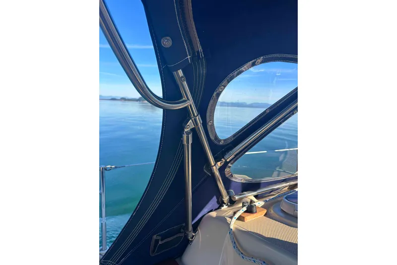 Slide: The Image of Close-up of 2002 Island Packet 350 sailboat cockpit with ocean view. - 21