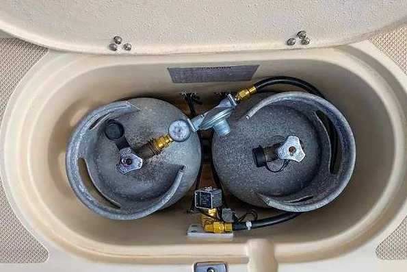 Slide: The Image of Propane tank storage compartment on a 2002 Island Packet 350 sailboat. - 89
