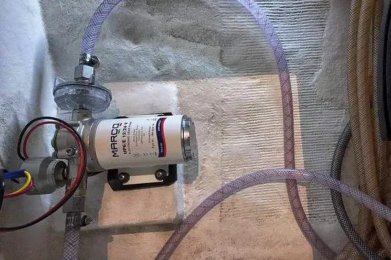 Slide: The Image of Water pump system in a 2002 Island Packet 350 sailboat. - 70