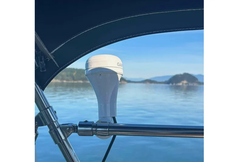 Slide: The Image of 2002 Island Packet 350 sailboat with Garmin equipment, scenic water view. - 22