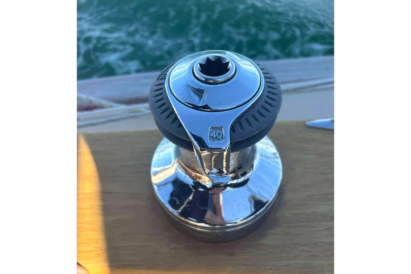 Slide: The Image of Close-up of a winch on a 2002 Island Packet 350 sailboat deck. - 23