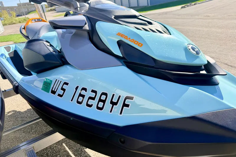 Slide: The Image of 2024 Seadoo GTR-X 300 & WAKE 170 jet ski, blue, parked outdoors. - 20