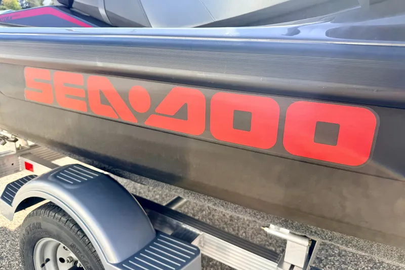 Slide: The Image of 2024 Seadoo GTR-X 300 & WAKE 170 on trailer, featuring bold red logo. - 29