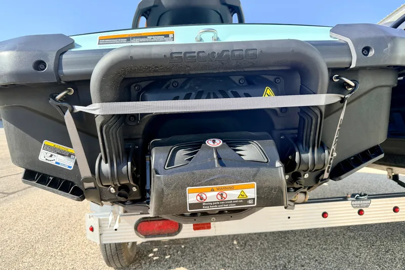Slide: The Image of 2024 Seadoo GTR-X 300 & WAKE 170 rear view on trailer, showcasing engine details. - 18