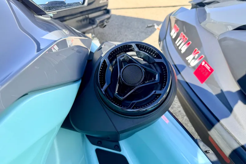 Slide: The Image of 2024 Seadoo GTR-X 300 and WAKE 170 jet skis with sleek design and speaker detail. - 44