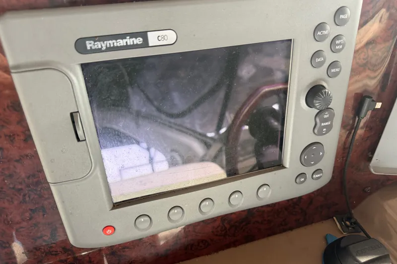 Slide: The Image of Raymarine C80 navigation system on 2005 Regal Commodore 3560 boat dashboard. - 6
