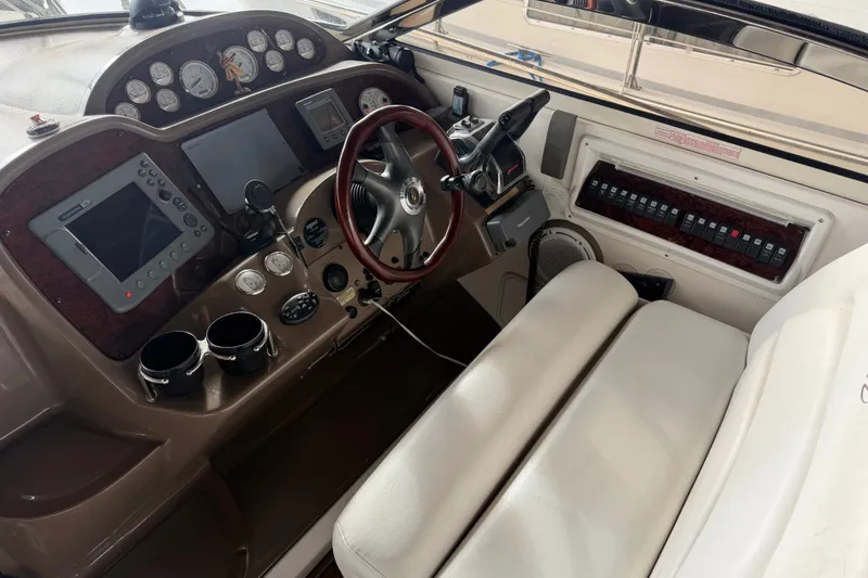 Slide: The Image of Cockpit of 2005 Regal Commodore 3560 with steering wheel and control panel. - 4