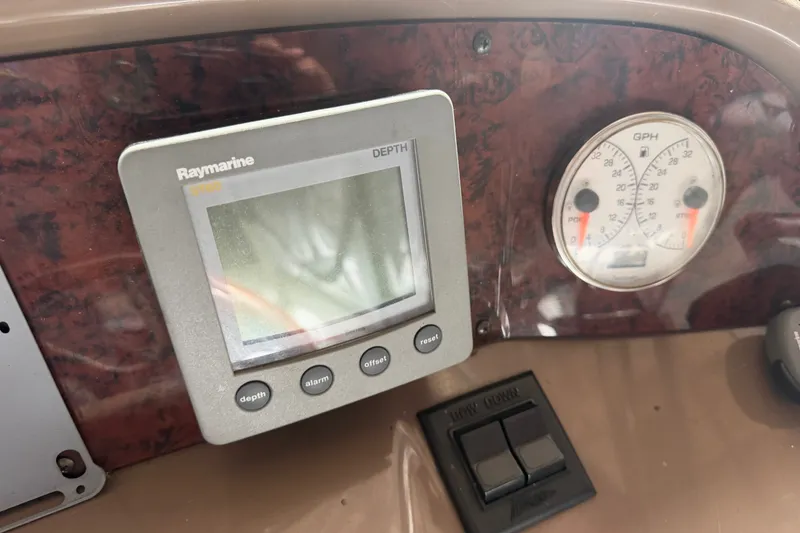 Slide: The Image of Control panel of a 2005 Regal Commodore 3560 with Raymarine depth gauge. - 7
