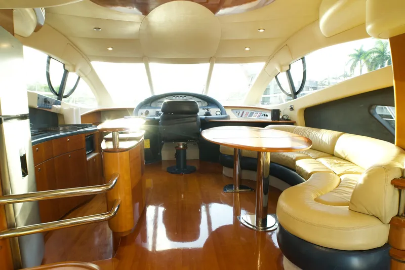 Slide: The Image of Luxurious interior of a 2007 Azimut 55E yacht with elegant seating and modern helm. - 36