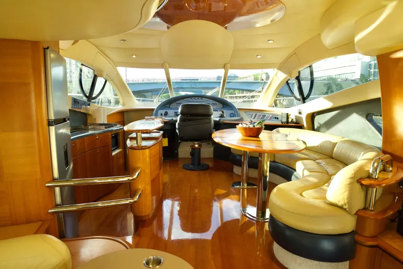 Slide: The Image of Luxurious interior of a 2007 Azimut 55E yacht with elegant seating and modern amenities. - 35