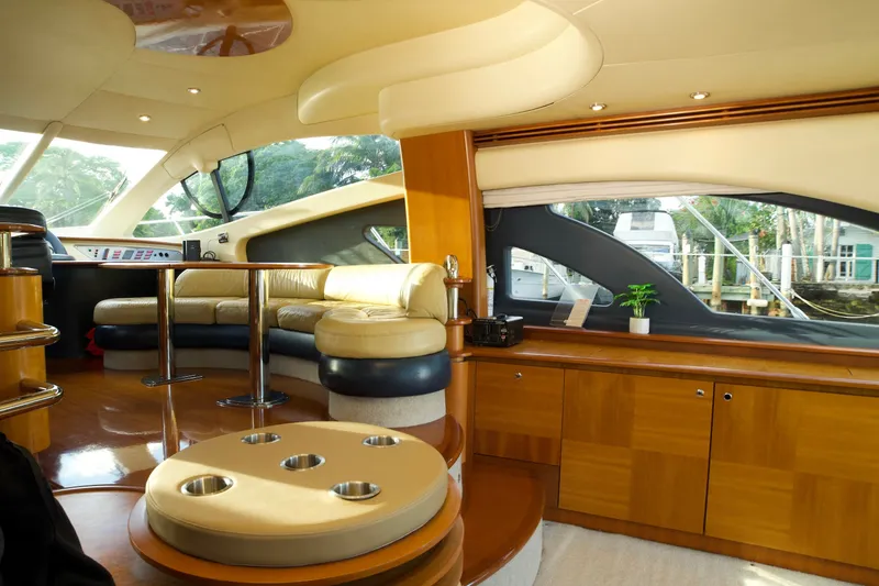 Slide: The Image of Luxurious interior of a 2007 Azimut 55E yacht with elegant seating and modern design. - 32