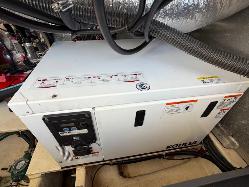 Slide: The Image of A Kohler generator in a 2013 Regal 35 Sport Coupe. - 15
