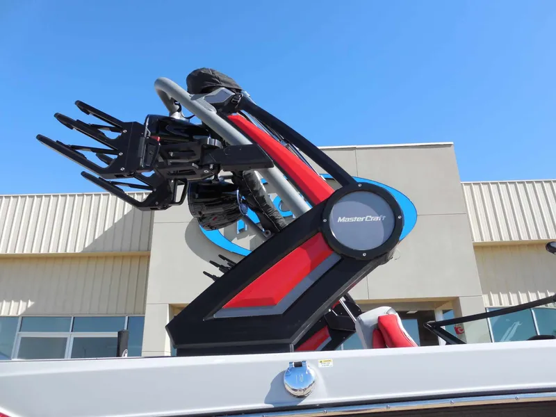Slide: The Image of The image shows a modern 2023 MasterCraft XStar S with a striking tower design. - 11