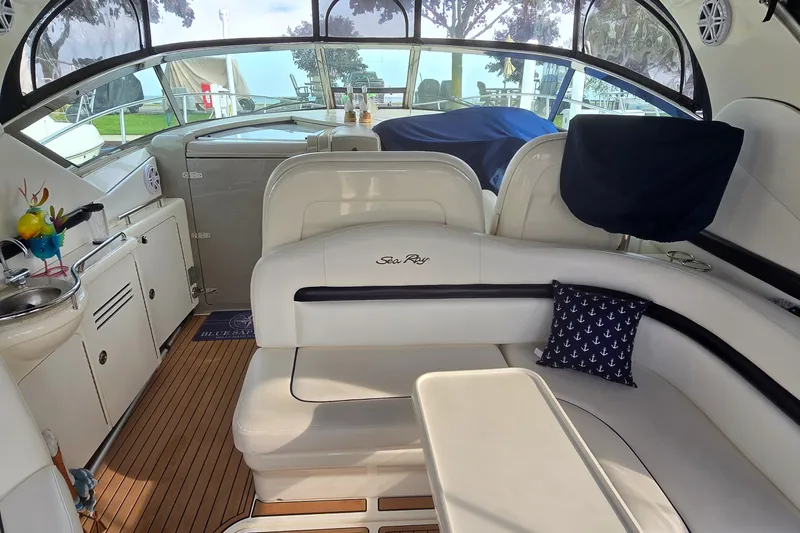 Slide: The Image of Luxurious interior of 2008 Sea Ray 38 Sundancer yacht with elegant seating and decor. - 9