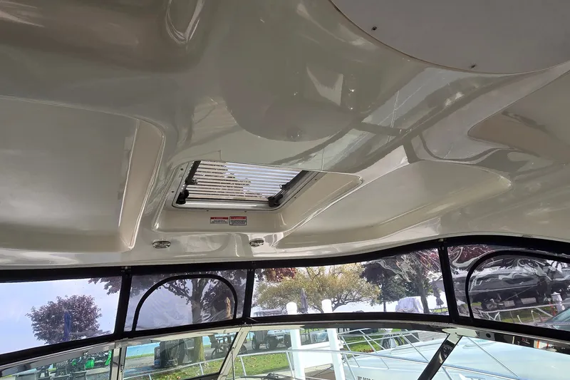 Slide: The Image of Interior view of 2008 Sea Ray 38 Sundancer boat with sunroof and windows. - 19