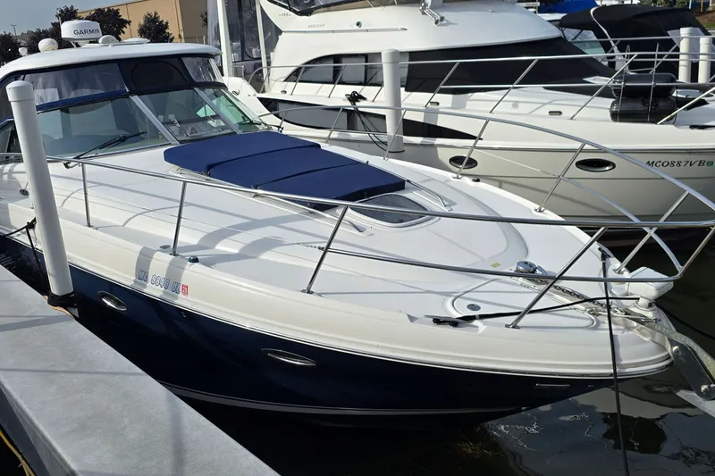 The Image of 2008 Sea Ray 38 Sundancer yacht docked at marina, featuring sleek design and modern amenities. - 2