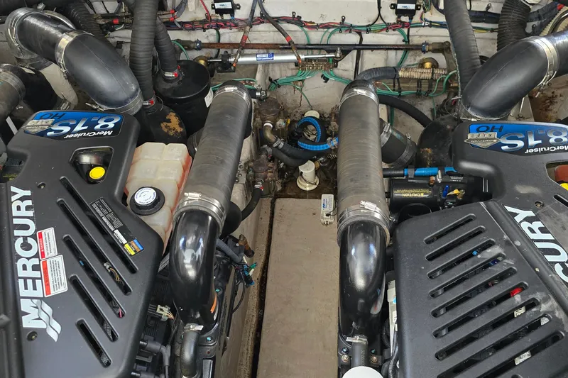Slide: The Image of Engine room of a 2008 Sea Ray 38 Sundancer with twin Mercury 8.1S motors. - 40