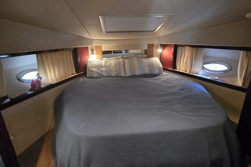 Slide: The Image of Luxurious cabin interior of 2008 Sea Ray 38 Sundancer yacht with cozy bed. - 30