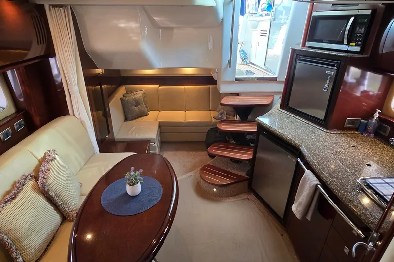 Slide: The Image of Luxurious interior of a 2008 Sea Ray 38 Sundancer yacht with modern amenities. - 36