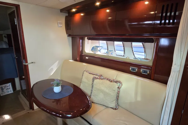 Slide: The Image of Luxurious interior of 2008 Sea Ray 38 Sundancer yacht with elegant seating and decor. - 28