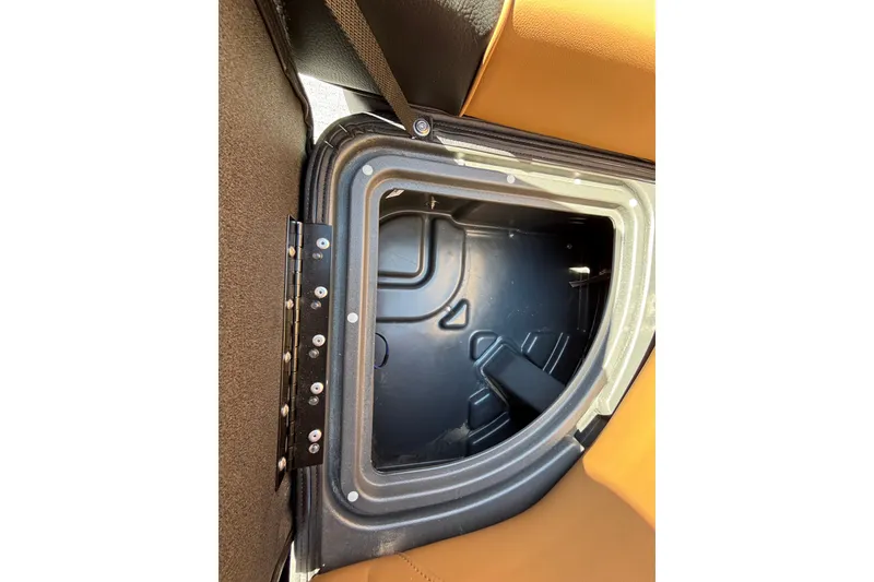 Slide: The Image of Storage compartment in 2027 Regency 230 DL3 boat, featuring durable interior design. - 19