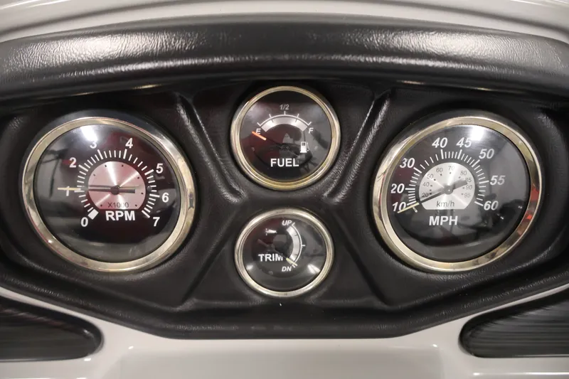 Slide: The Image of Dashboard of 2021 Lowe SS 210 CL boat with RPM, fuel, and speed gauges. - 21